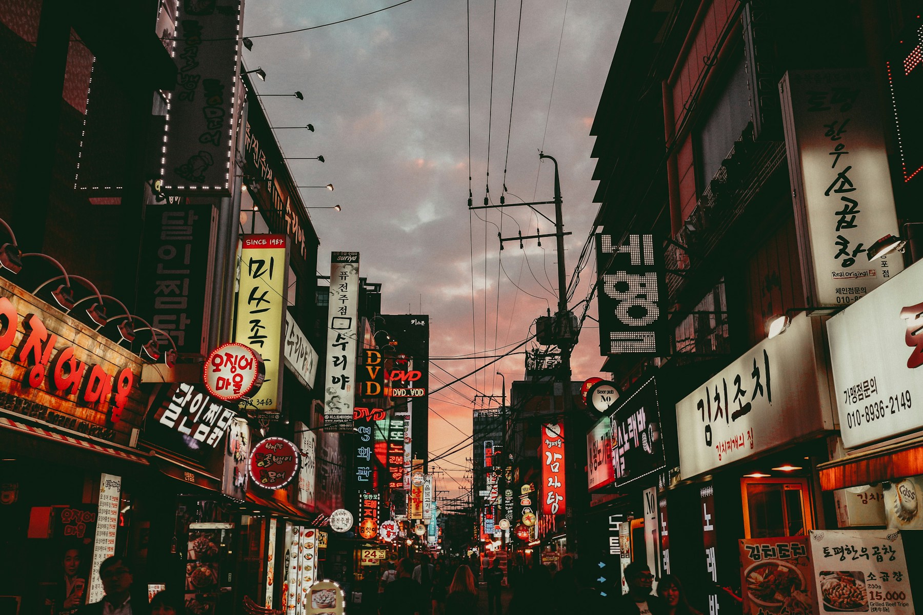 A lively Seoul street at dusk